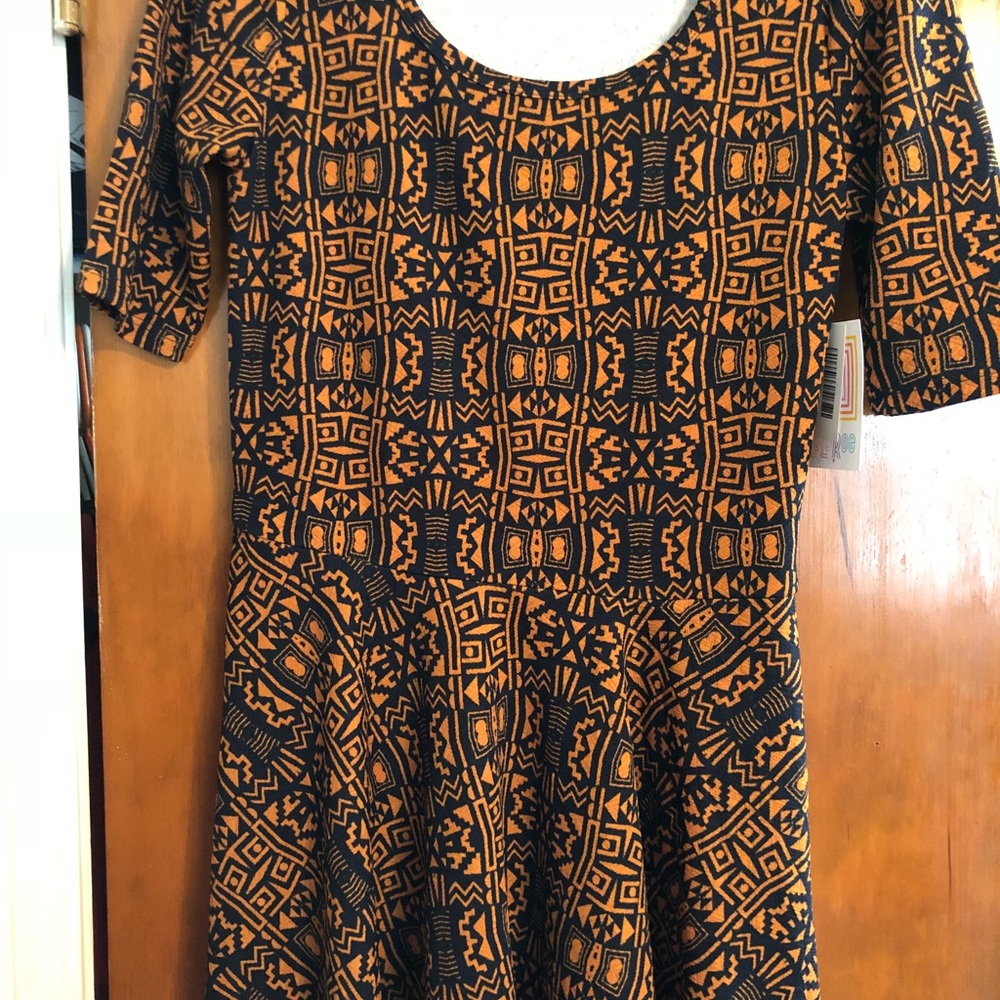 Brand new Lularoe Nicole dress orange/ black